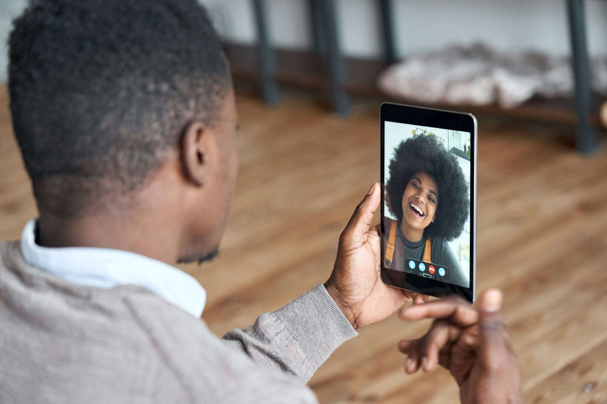 Man and woman on a video date