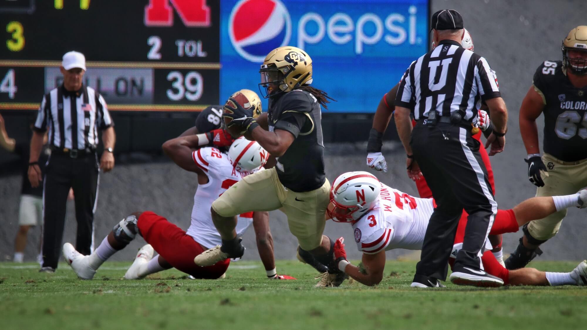 American Football players mid-game