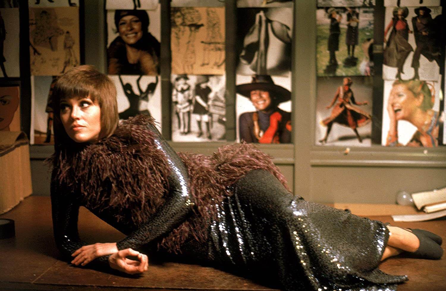 Jane Fonda as Bree Daniels in Klute wearing long sequinned dress and boa