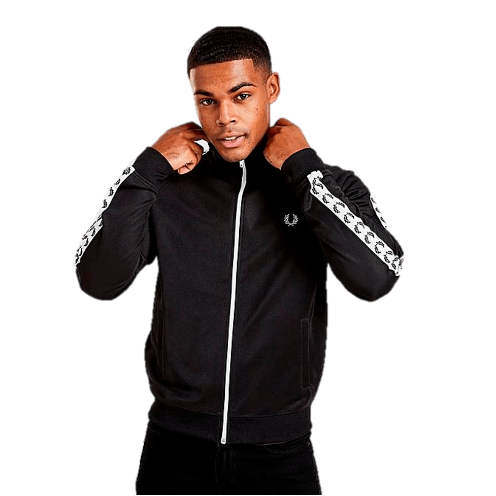 Man in black and white Fred Perry Taped track jacket