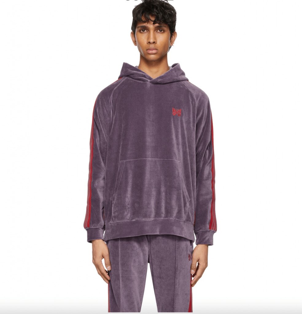 Man in Needles purple and red velour tracksuit