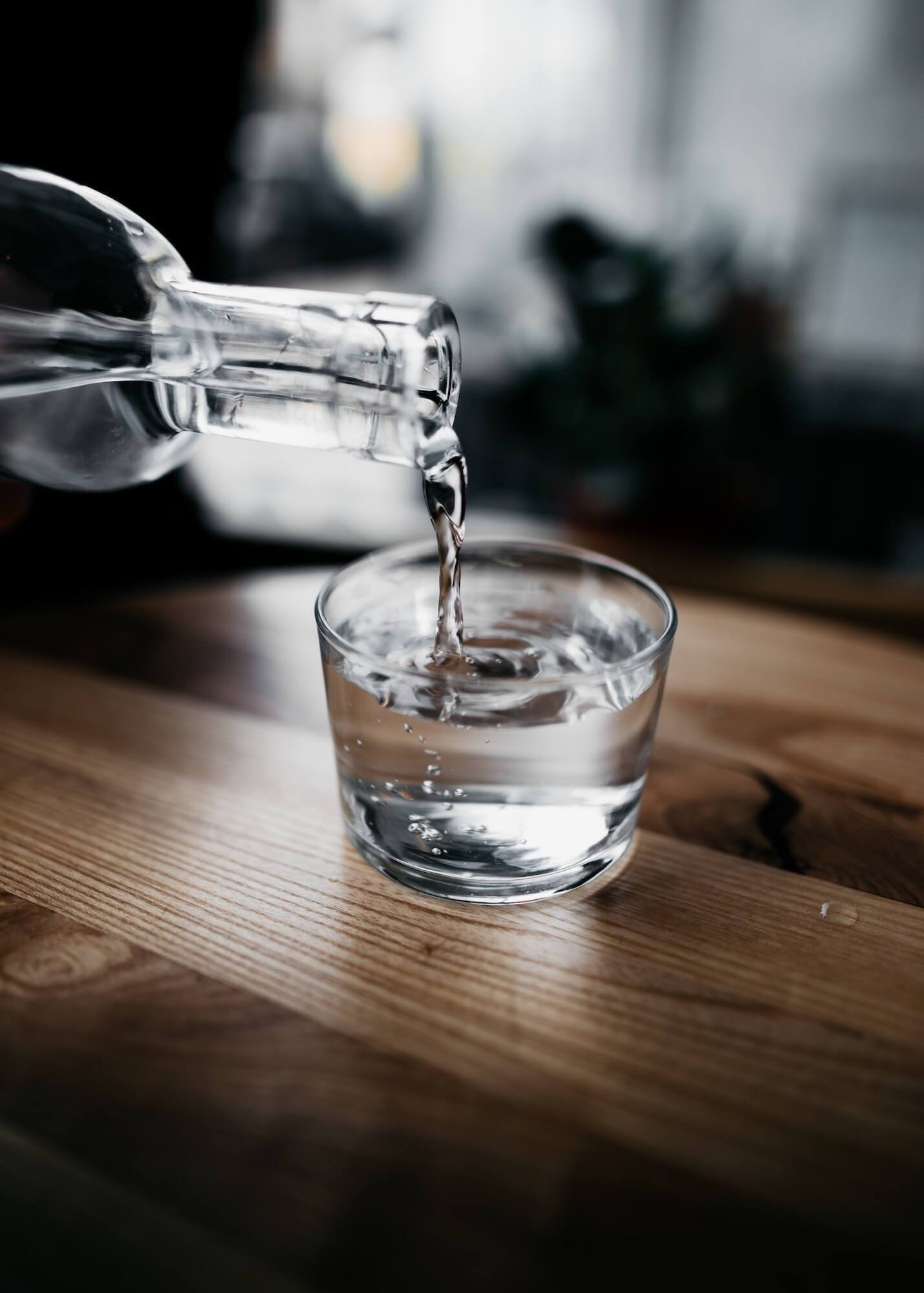 Water being poured into a tumbler glass