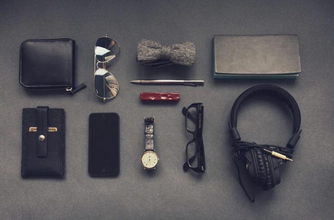 Men's accessories neatly laid out